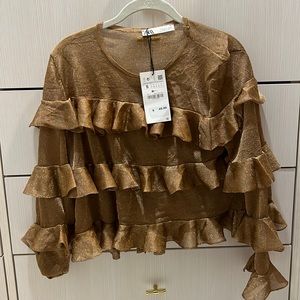 Zara ruffle gold top